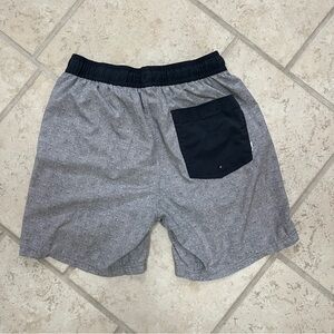 Vuori Men's Gray Athletic Shorts with Black Waistband and Pocket